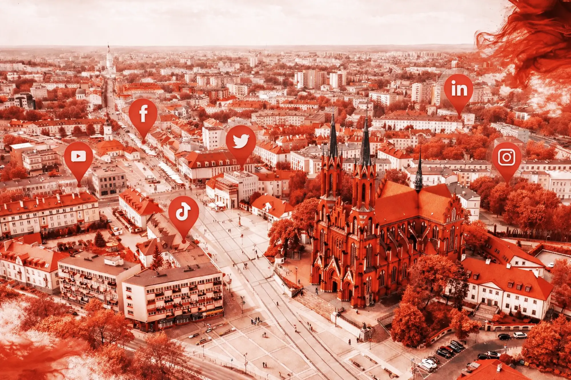 Widok Białegostoku z ikonami mediów społecznościowych – Facebook, Instagram, LinkedIn, TikTok – symbolizującymi lokalny marketing cyfrowy w stolicy Podlasia